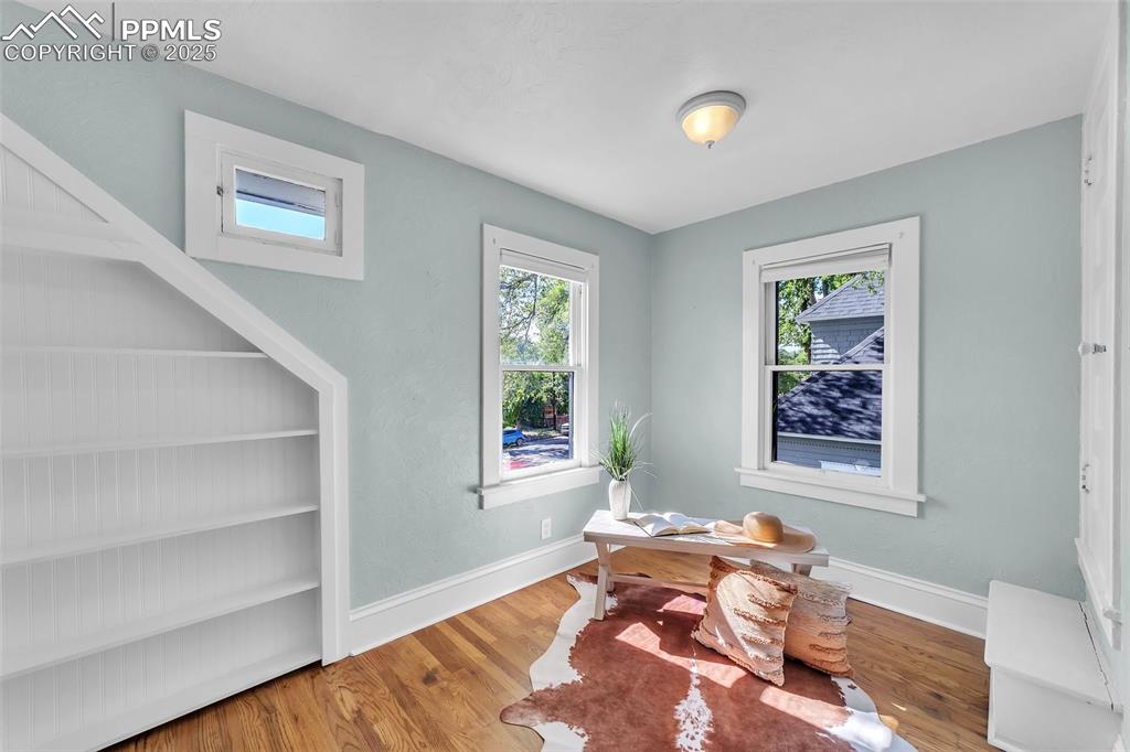 319 South Institute Street Colorado Springs, CO 80903 - Photo 17 of 49 a bedroom with a bed and a window