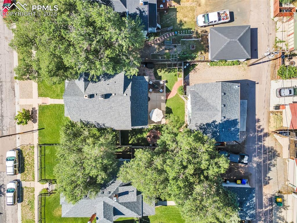 319 South Institute Street Colorado Springs, CO 80903 - Photo 2 of 49 an aerial view of a house with a yard and a large tree