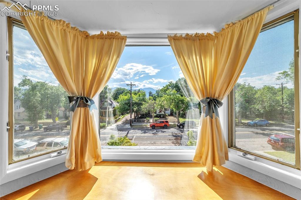 319 South Institute Street Colorado Springs, CO 80903 - Photo 22 of 49 a view of a room with a large window and tree