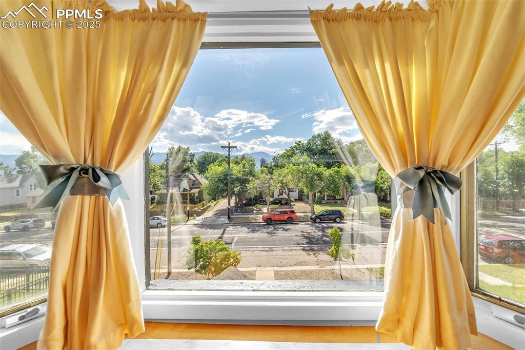 319 South Institute Street Colorado Springs, CO 80903 - Photo 23 of 49 a view of living room with a fireplace and outer view