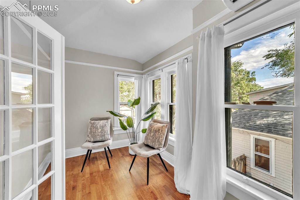 319 South Institute Street Colorado Springs, CO 80903 - Photo 26 of 49 a workspace with furniture and a window