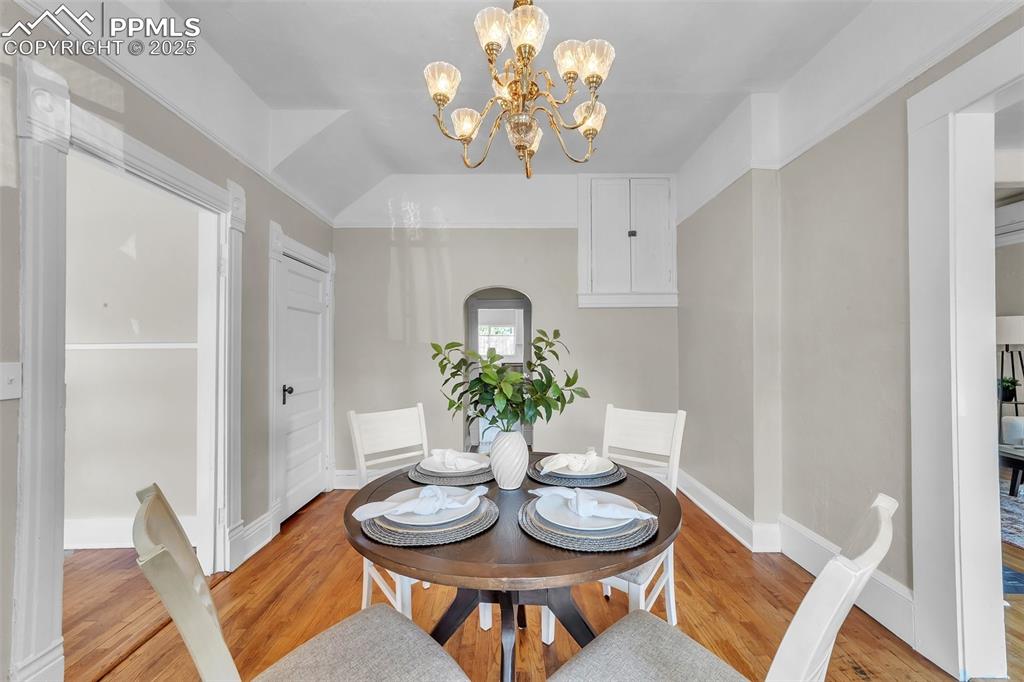 319 South Institute Street Colorado Springs, CO 80903 - Photo 3 of 49 a view of a dining room with furniture and chandelier
