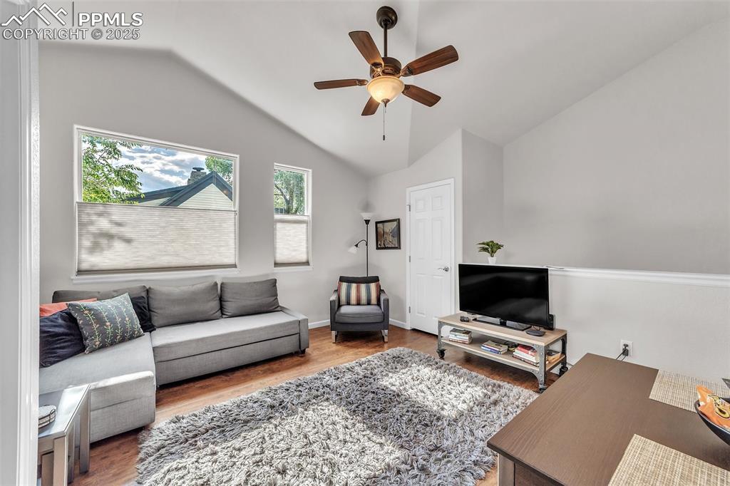 319 South Institute Street Colorado Springs, CO 80903 - Photo 36 of 49 a living room with furniture and a flat screen tv