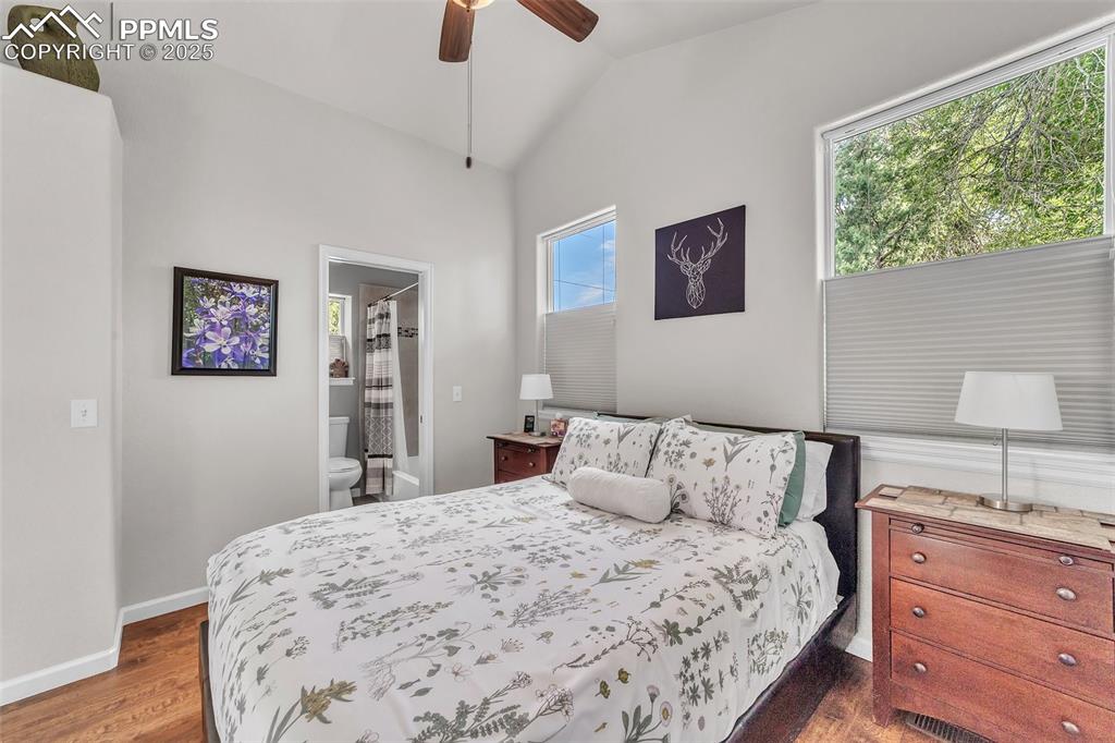 319 South Institute Street Colorado Springs, CO 80903 - Photo 37 of 49 a bedroom with a bed and a window