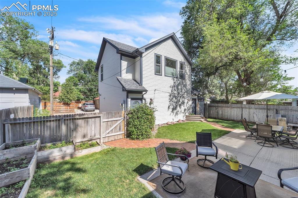 319 South Institute Street Colorado Springs, CO 80903 - Photo 40 of 49 a view of backyard with patio and outdoor seating