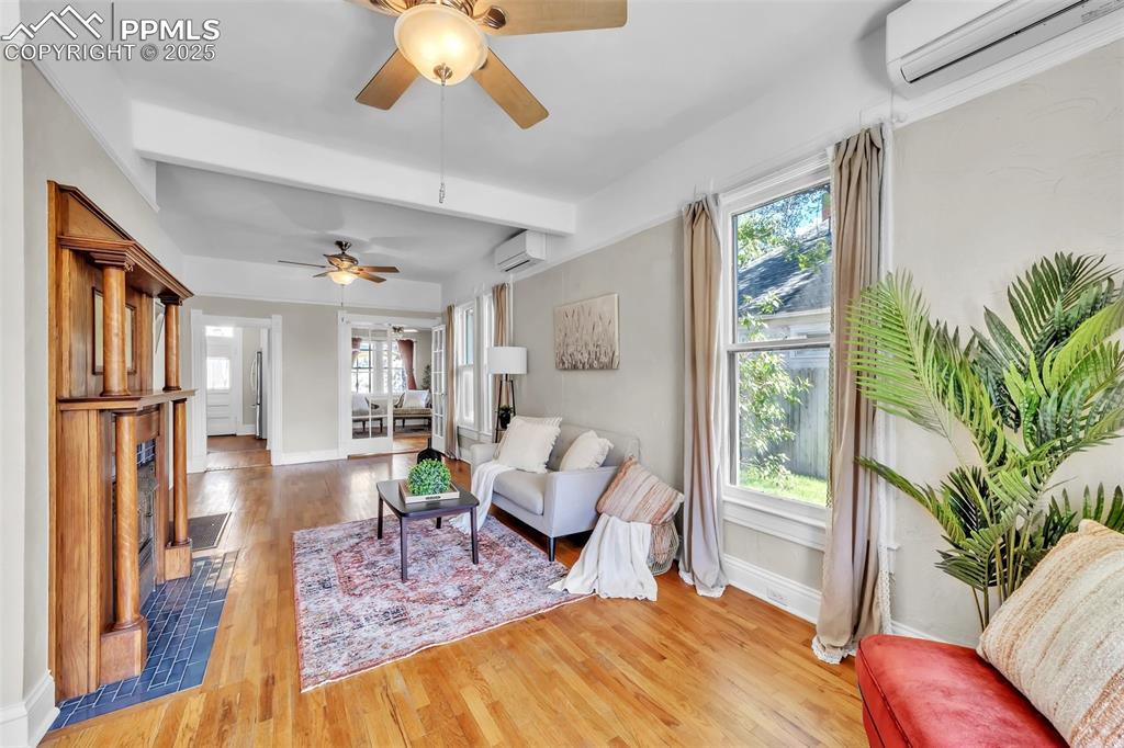 319 South Institute Street Colorado Springs, CO 80903 - Photo 4 of 49 a living room with furniture and a large window