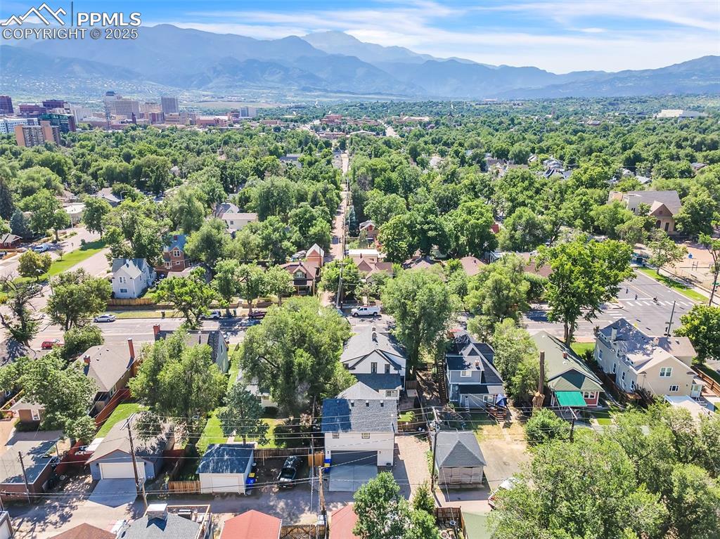 319 South Institute Street Colorado Springs, CO 80903 - Photo 43 of 49 an aerial view of a city with lots of residential buildings and mountain view in back