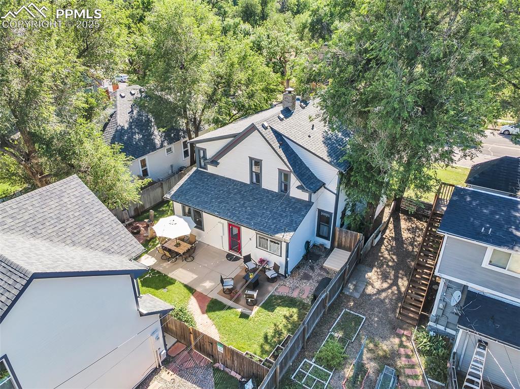 319 South Institute Street Colorado Springs, CO 80903 - Photo 44 of 49 an aerial view of a house with table and chairs under an umbrella