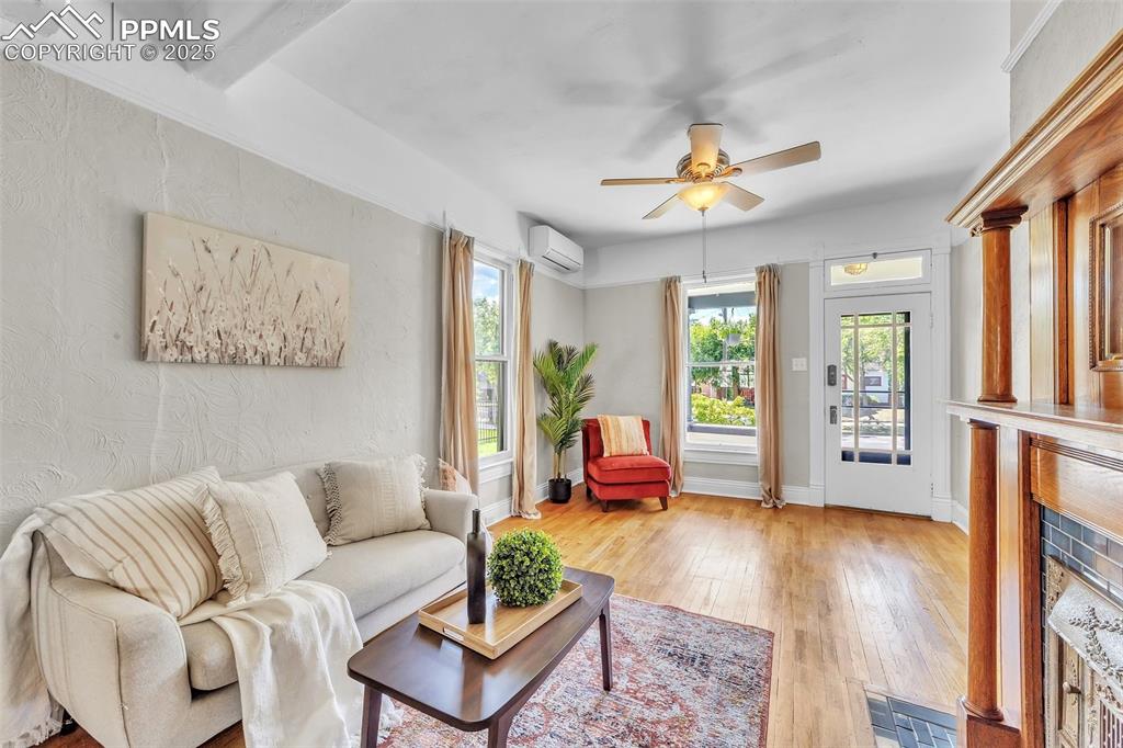 319 South Institute Street Colorado Springs, CO 80903 - Photo 5 of 49 a living room with furniture and a large window