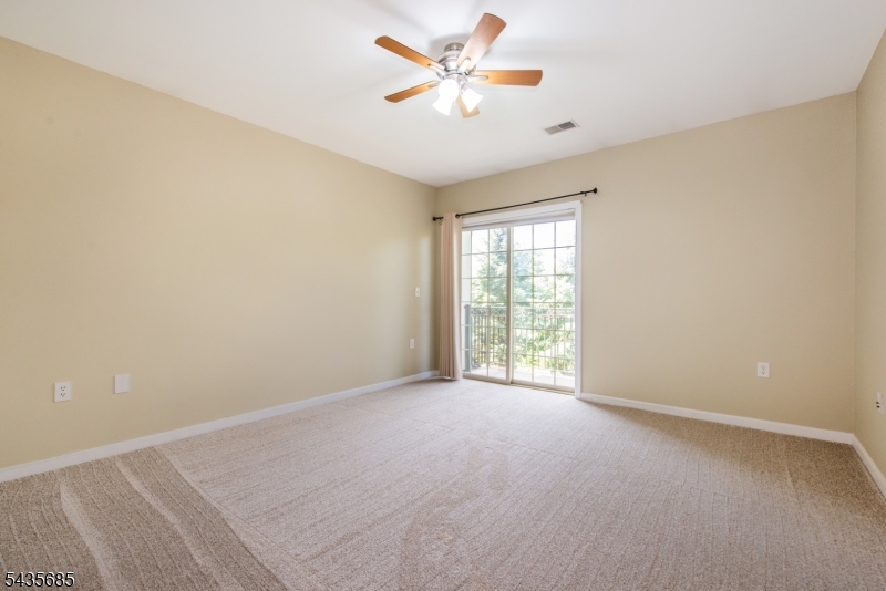 16 Main Street Sparta, NJ 07871 - Photo 26 of 33 a view of an empty room with a window