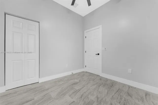 a view of a bathroom with a washer and dryer