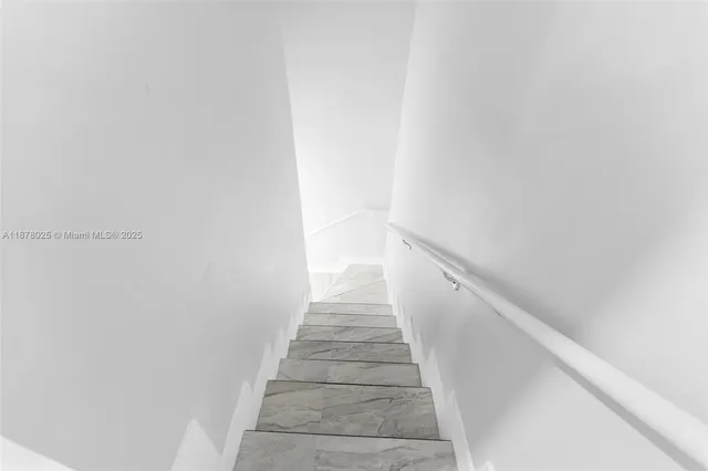 a garden with wooden fence