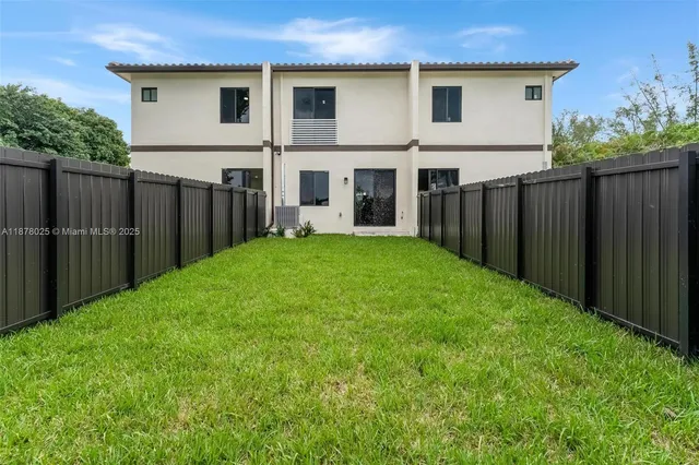 a view of a lake with a houses