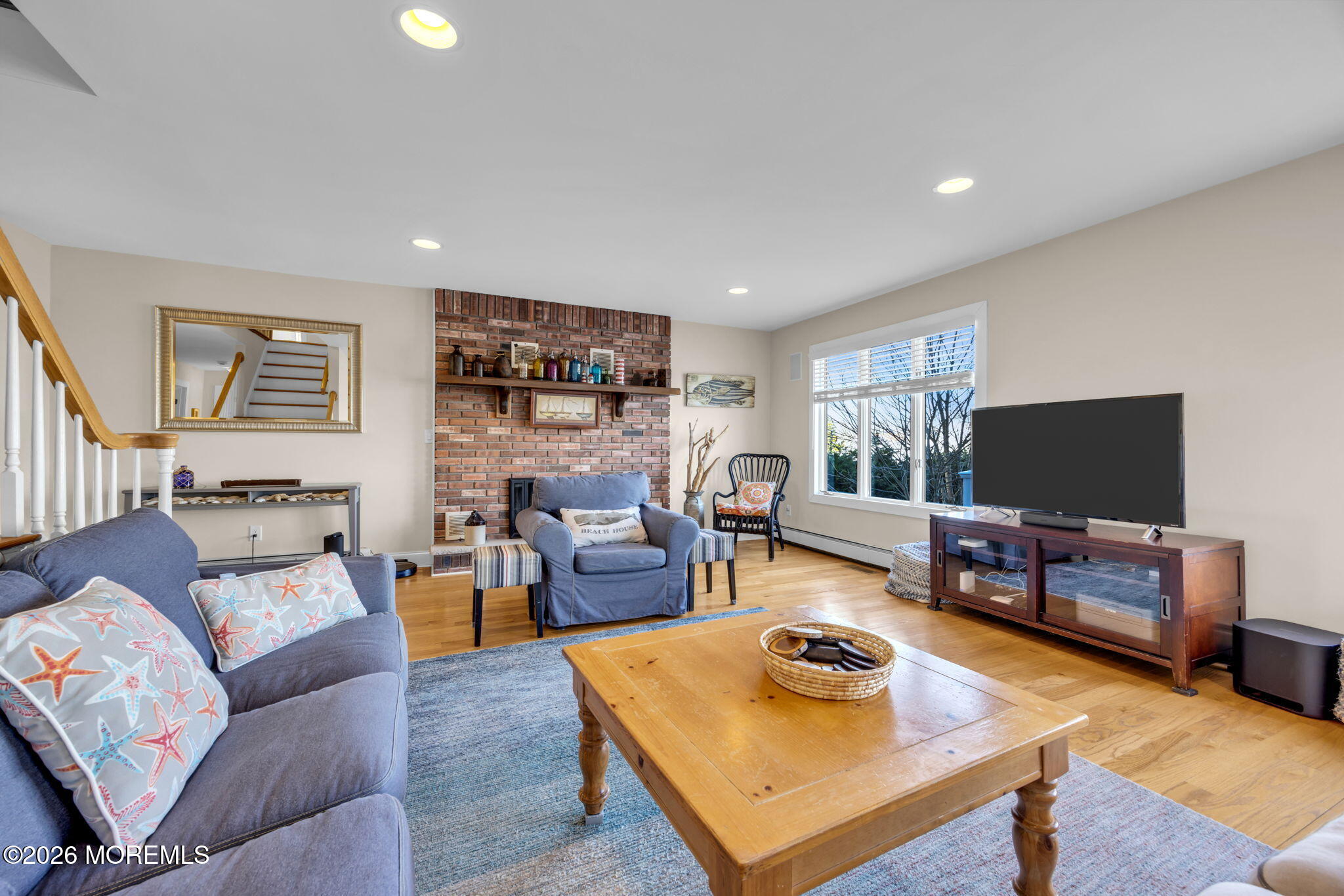 211 Forman Avenue Point Pleasant Beach, NJ 08742 - Photo 11 of 69 a living room with furniture and a flat screen tv