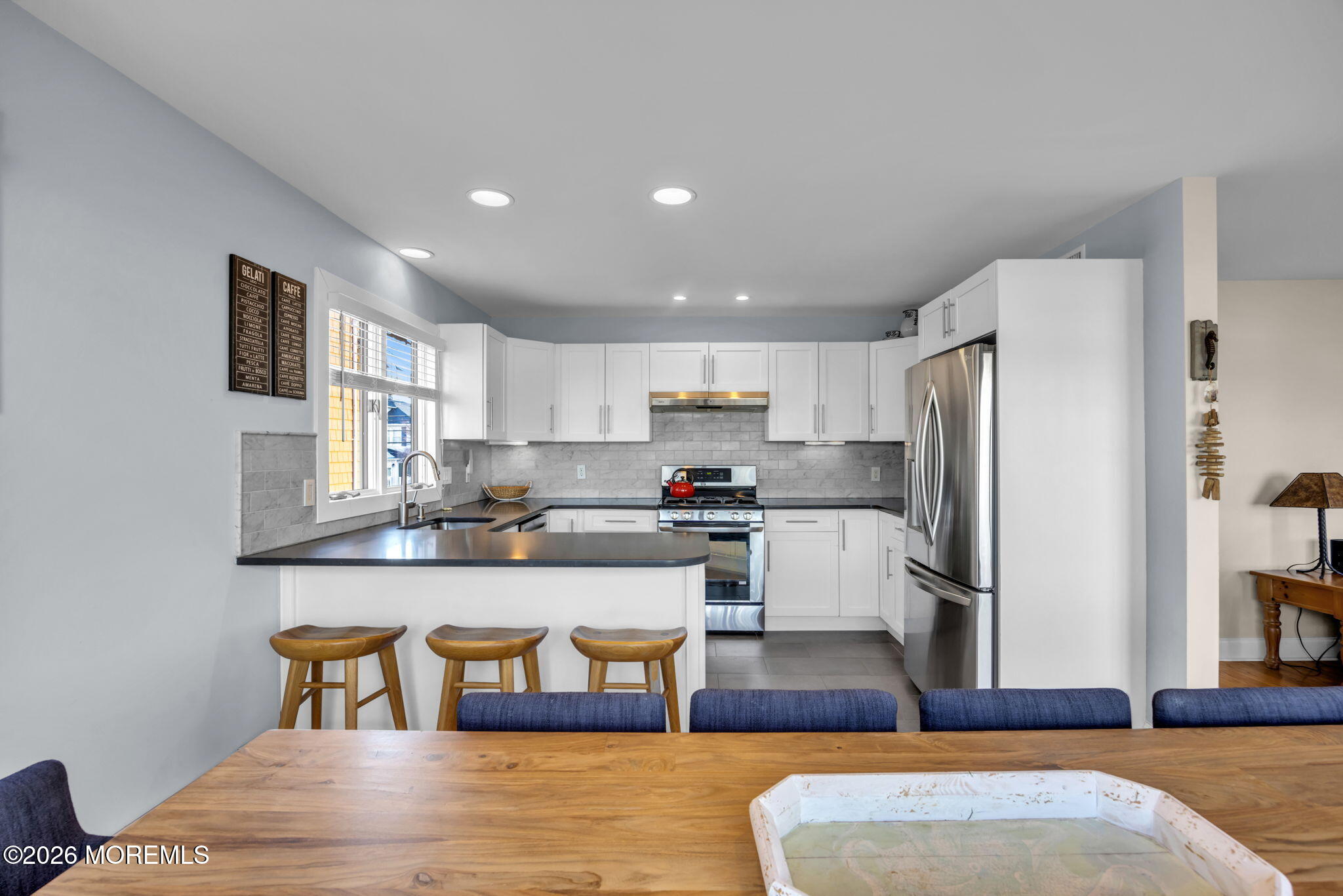 211 Forman Avenue Point Pleasant Beach, NJ 08742 - Photo 17 of 69 a living room with stainless steel appliances granite countertop furniture and a couch