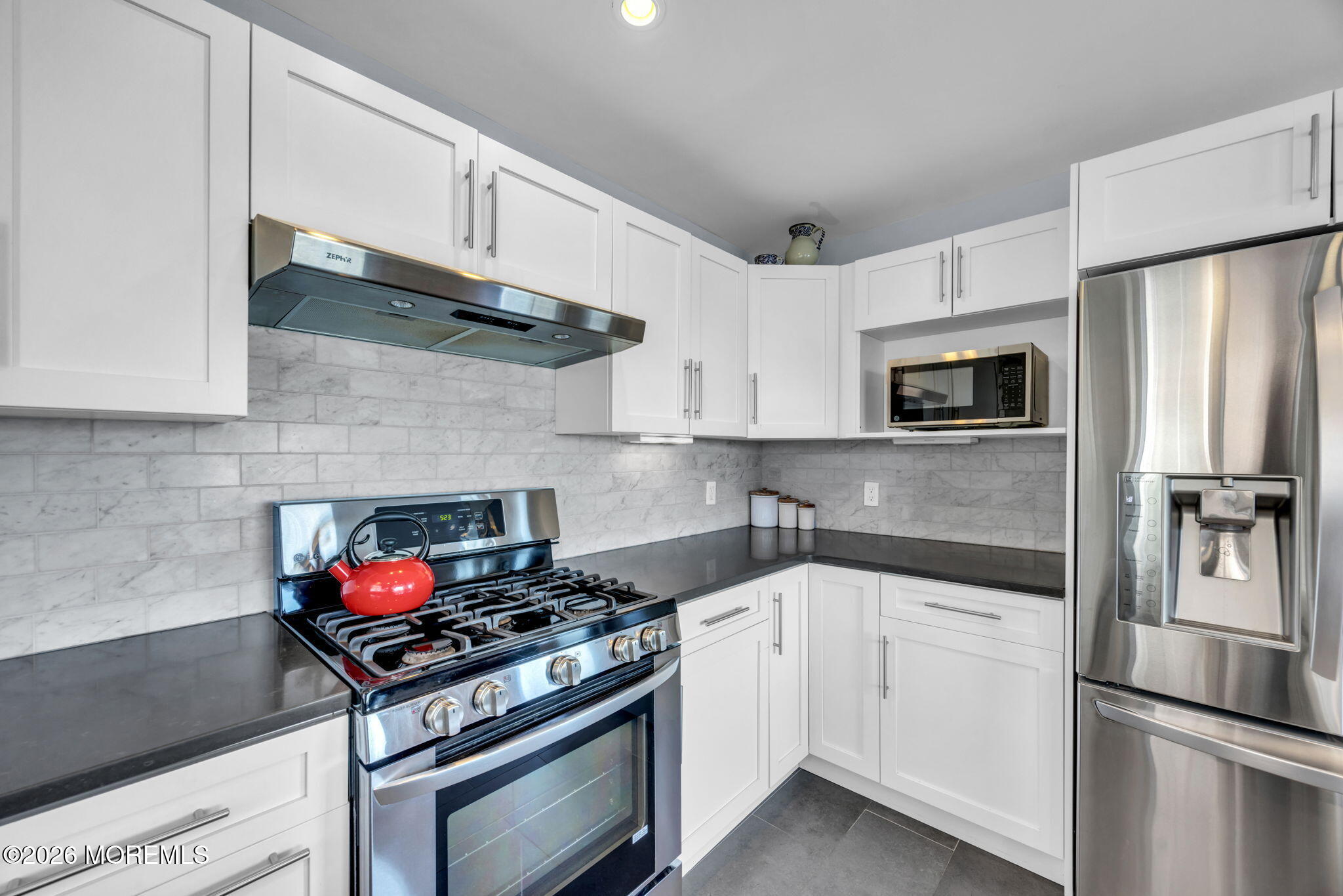 211 Forman Avenue Point Pleasant Beach, NJ 08742 - Photo 20 of 69 a kitchen with cabinets stainless steel appliances and a counter space