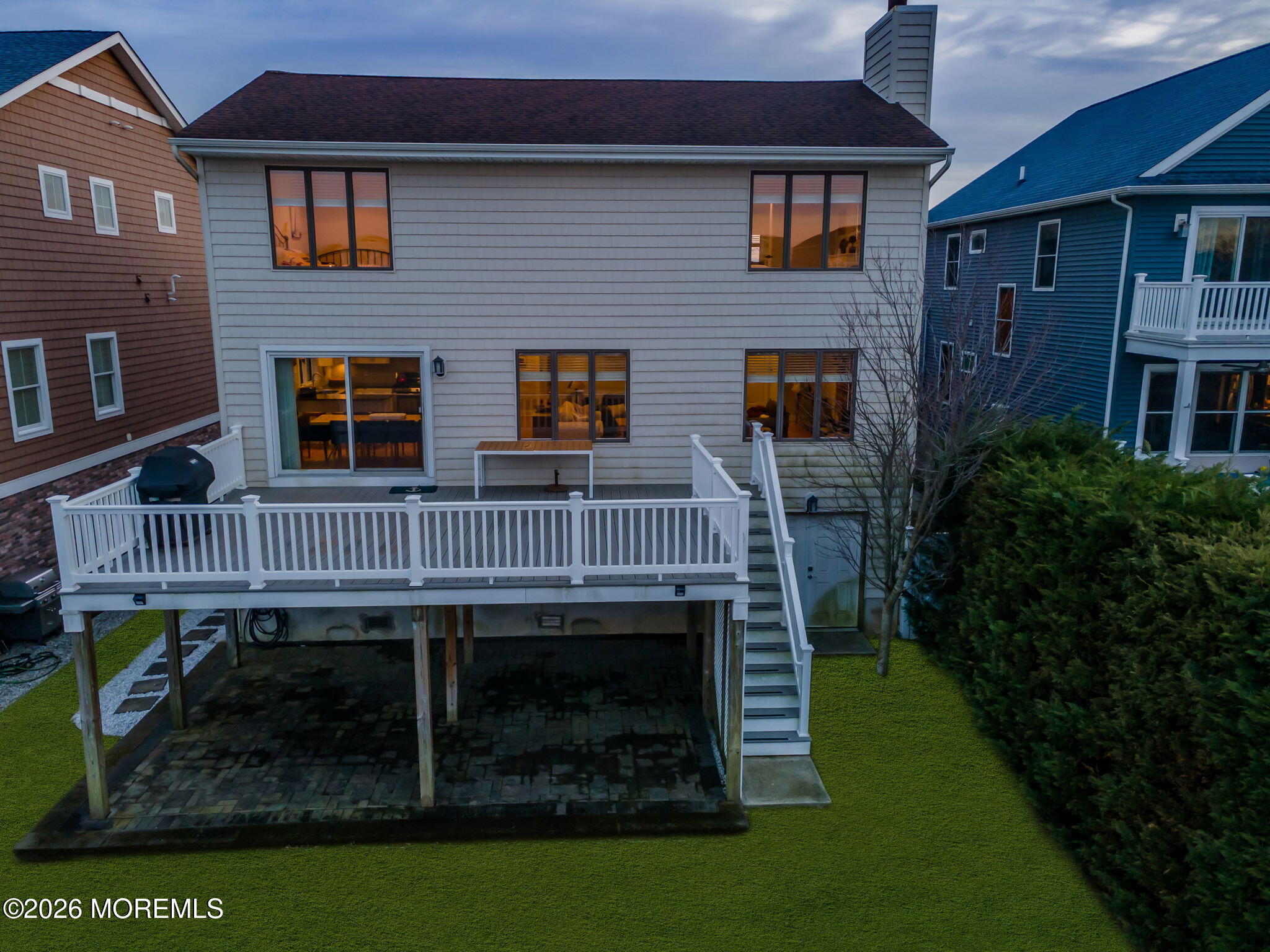 211 Forman Avenue Point Pleasant Beach, NJ 08742 - Photo 2 of 69 a view of a brick house with many windows and a yard