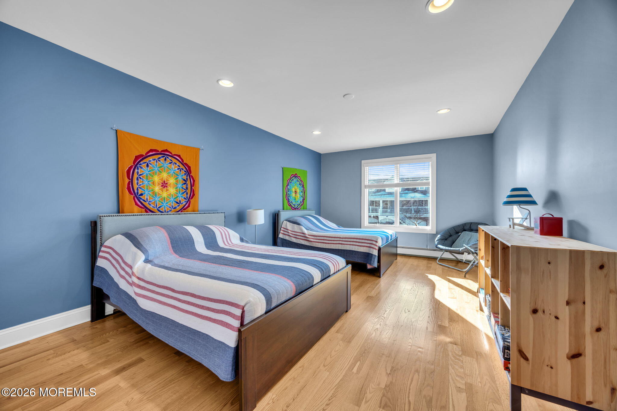 211 Forman Avenue Point Pleasant Beach, NJ 08742 - Photo 21 of 69 a spacious bedroom with a bed and a couch