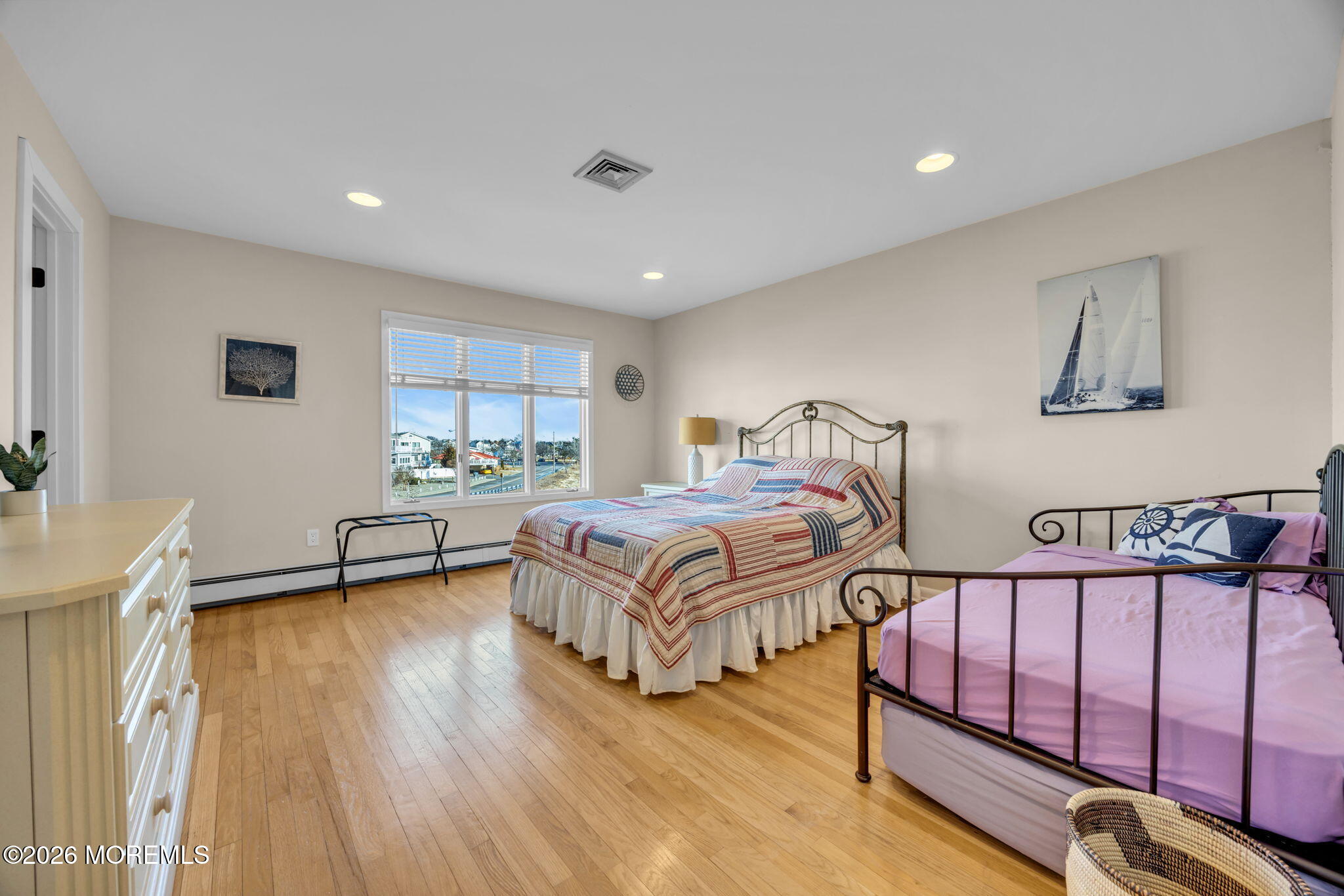 211 Forman Avenue Point Pleasant Beach, NJ 08742 - Photo 24 of 69 a bedroom with a bed and a window