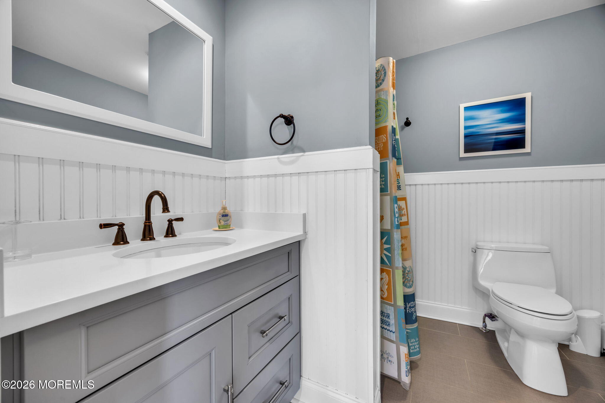 211 Forman Avenue Point Pleasant Beach, NJ 08742 - Photo 26 of 69 a bathroom with a sink a toilet and a mirror