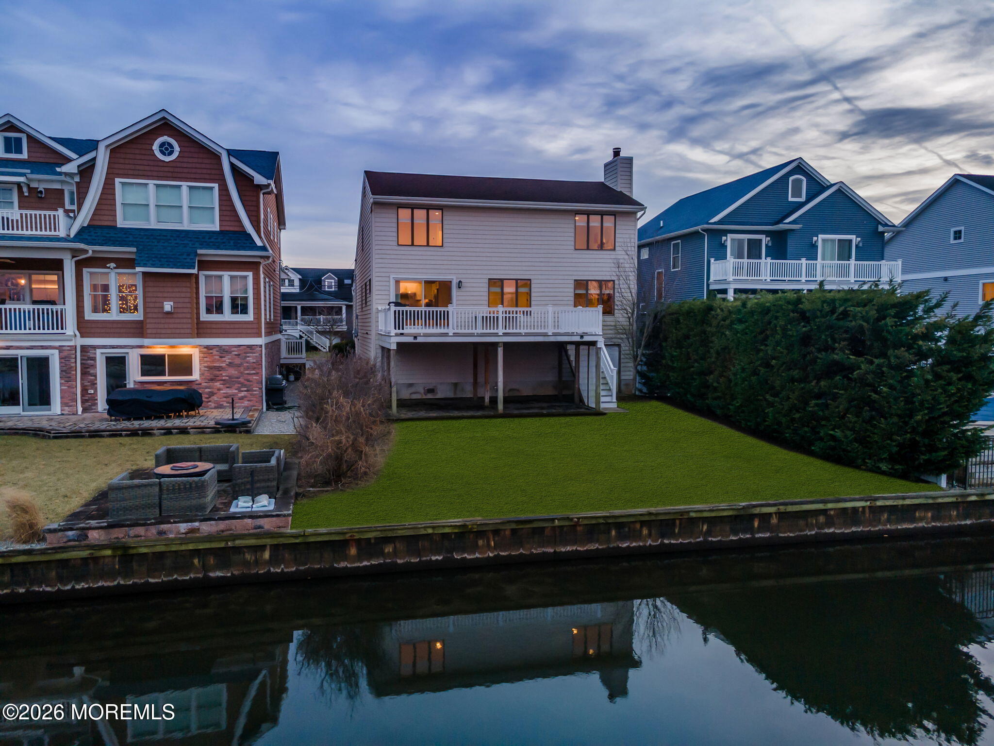 211 Forman Avenue Point Pleasant Beach, NJ 08742 - Photo 61 of 69 a front view of a house with a garden and lake view
