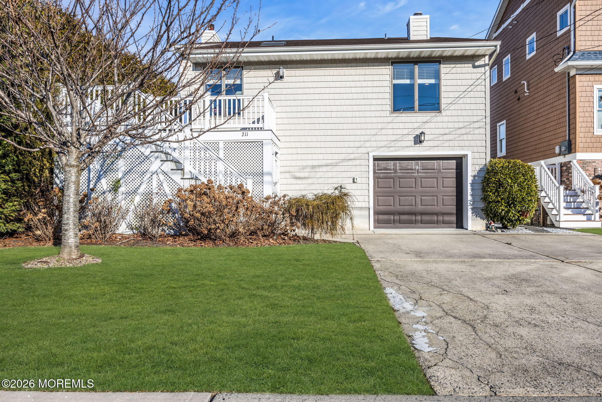 211 Forman Avenue Point Pleasant Beach, NJ 08742 - Photo 66 of 69 a front view of a house with garden