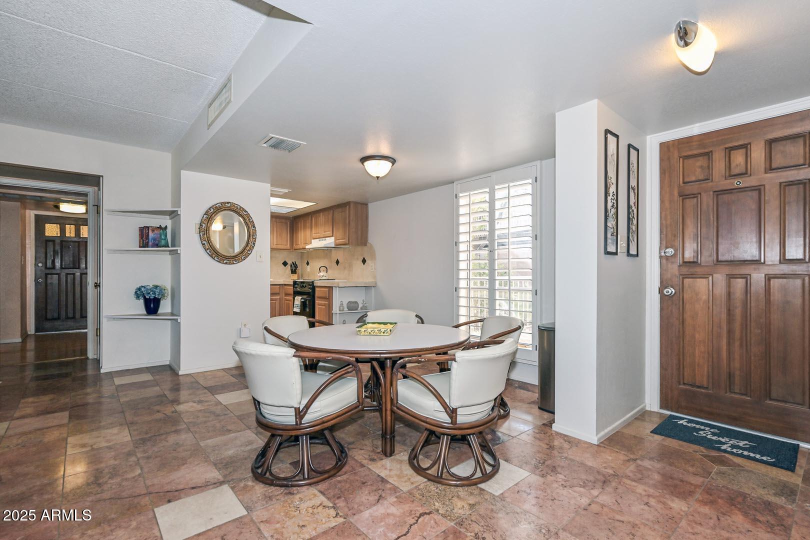 7402 East Carefree Drive, Unit 214 Carefree, AZ 85377 - Photo 9 of 26 Dining in Greatroom