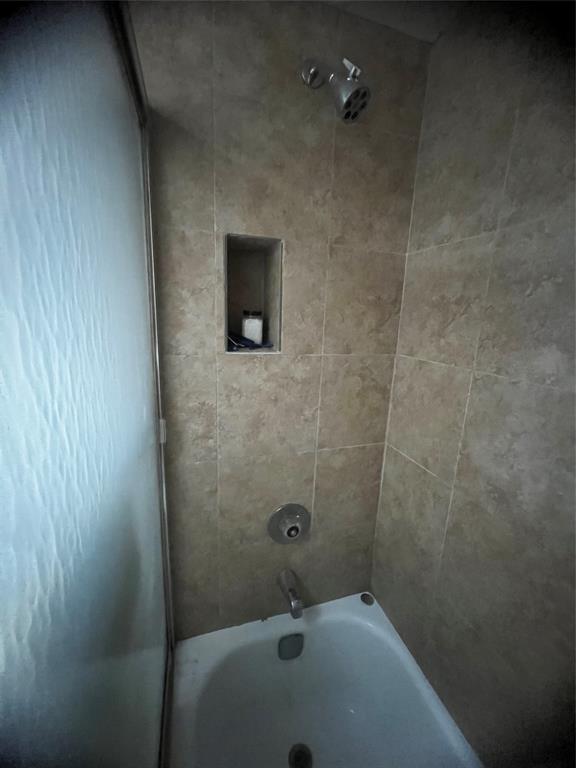 9091 Lime Bay Boulevard, Unit 114 Tamarac, FL 33321 - Photo 12 of 21 a bathroom with a sink