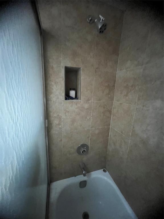 9091 Lime Bay Boulevard, Unit 114 Tamarac, FL 33321 - Photo 14 of 21 a bathroom with a sink