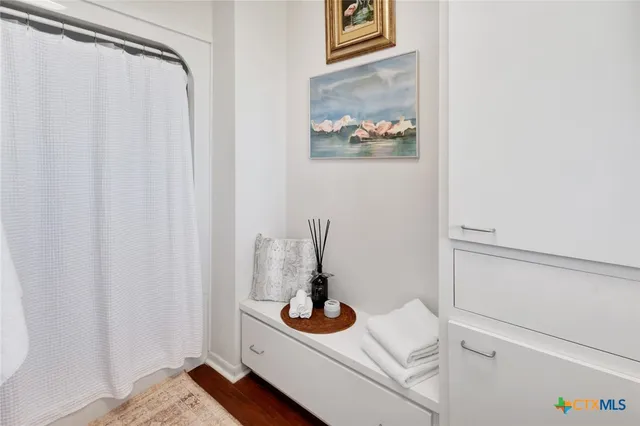 a view of a hallway with front door