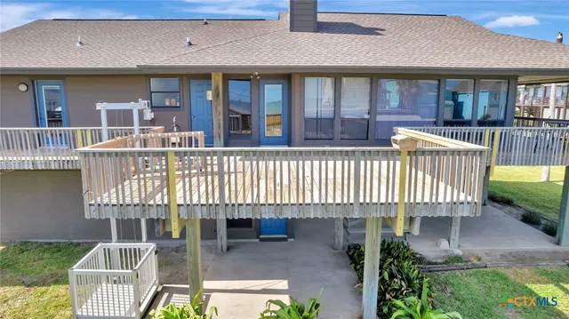 a front view of a house with a patio