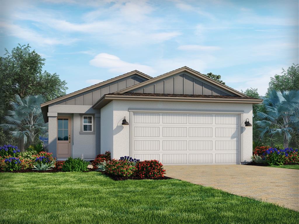 2257 Hen Road Minneola, FL 34715 - Photo 1 of 1 a front view of a house with a yard and garage