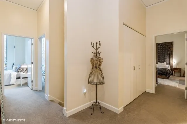 a hallway with two couches and a livingroom view