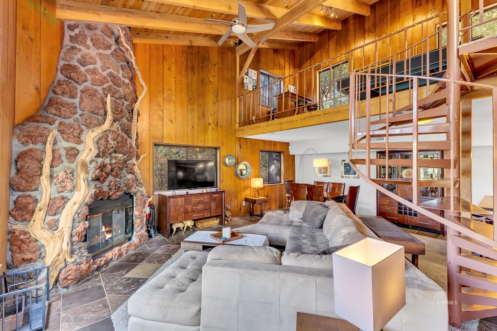 53580 Jeffery Pine Road Idyllwild, CA 92549 - Photo 21 of 90 a view of a living room with furniture and a flat screen tv