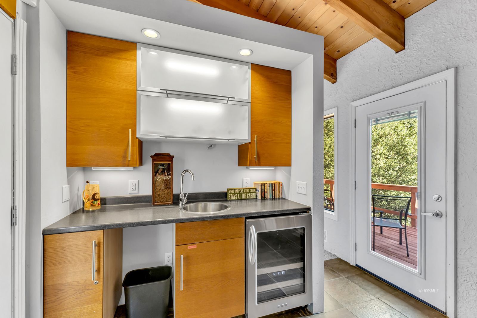 53580 Jeffery Pine Road Idyllwild, CA 92549 - Photo 48 of 90 a kitchen with a sink a window and cabinets
