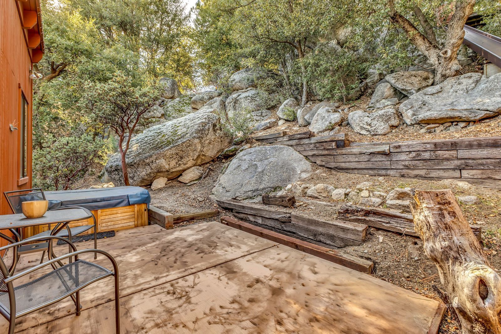 53580 Jeffery Pine Road Idyllwild, CA 92549 - Photo 63 of 90 a backyard of a house with table and chairs