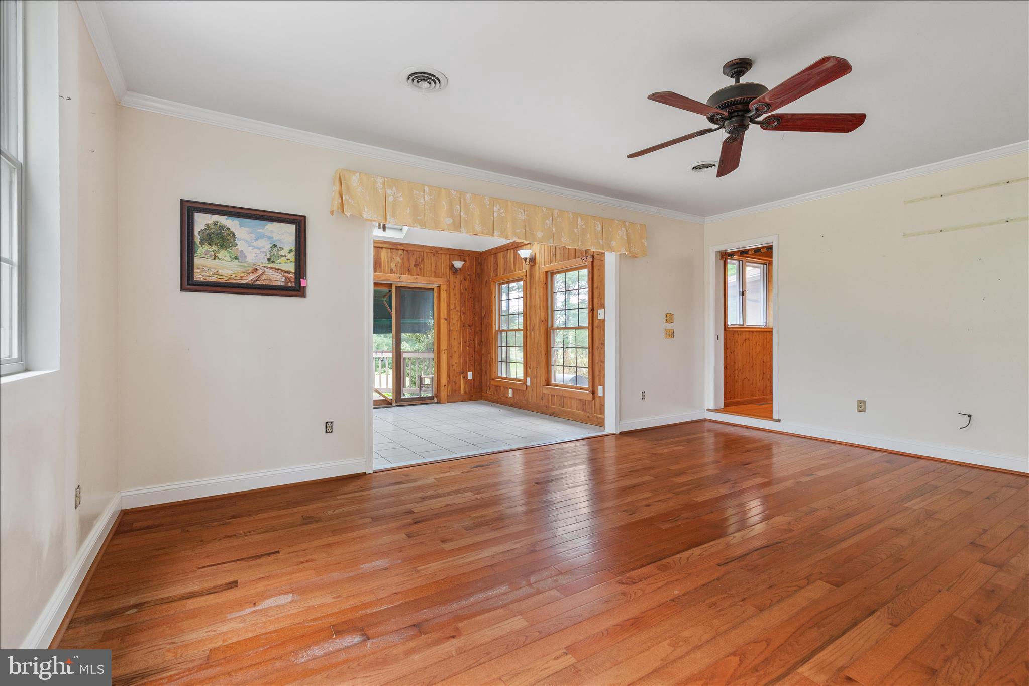 263 Bowling Green Road Front Royal, VA 22630 - Photo 27 of 75 a view of an empty room with window and wooden floor