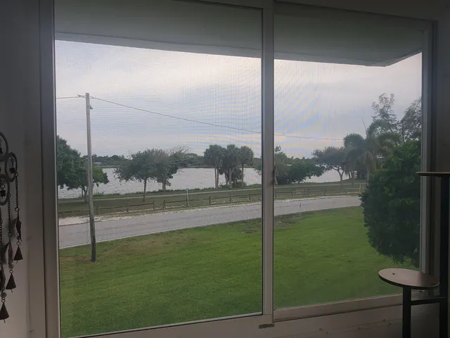 a view of a lake from a window