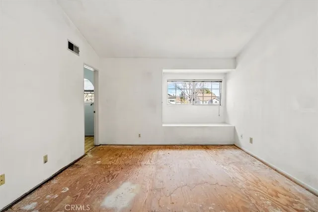 an empty room with window