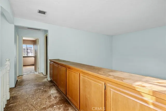 a view of a bathroom with toilet and a bathtub