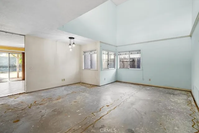 an empty room with windows