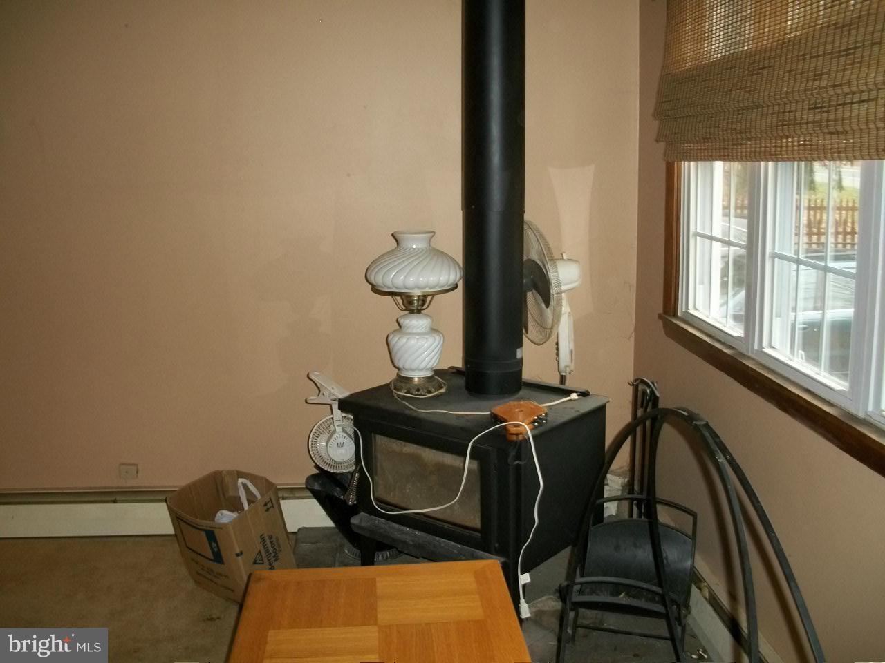 3208 Conowingo Road Street, MD 21154 - Photo 12 of 30 Living Room - woodstove