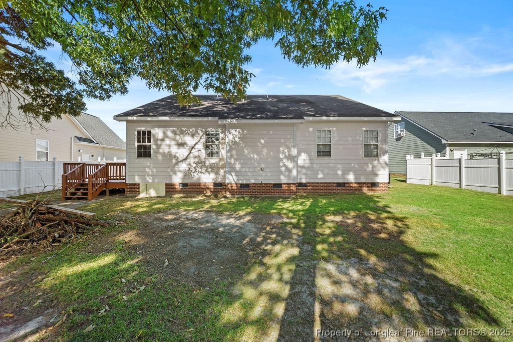 2905 Bakers Mill Road Fayetteville, NC 28306 - Photo 23 of 24 a view of house with a yard