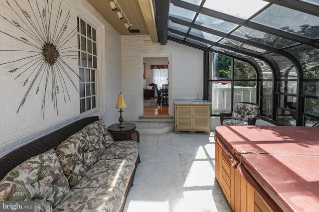 a bedroom with a bed and a fireplace