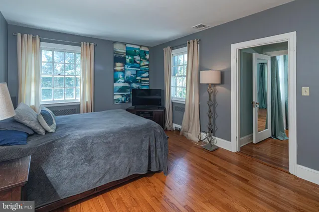 a view of an empty room with a fireplace