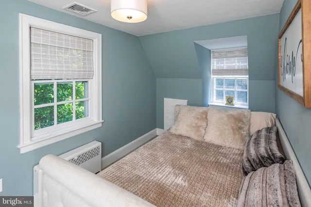 a front view of a house with a porch