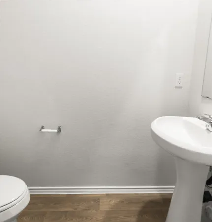 a bathroom with a sink and a toilet
