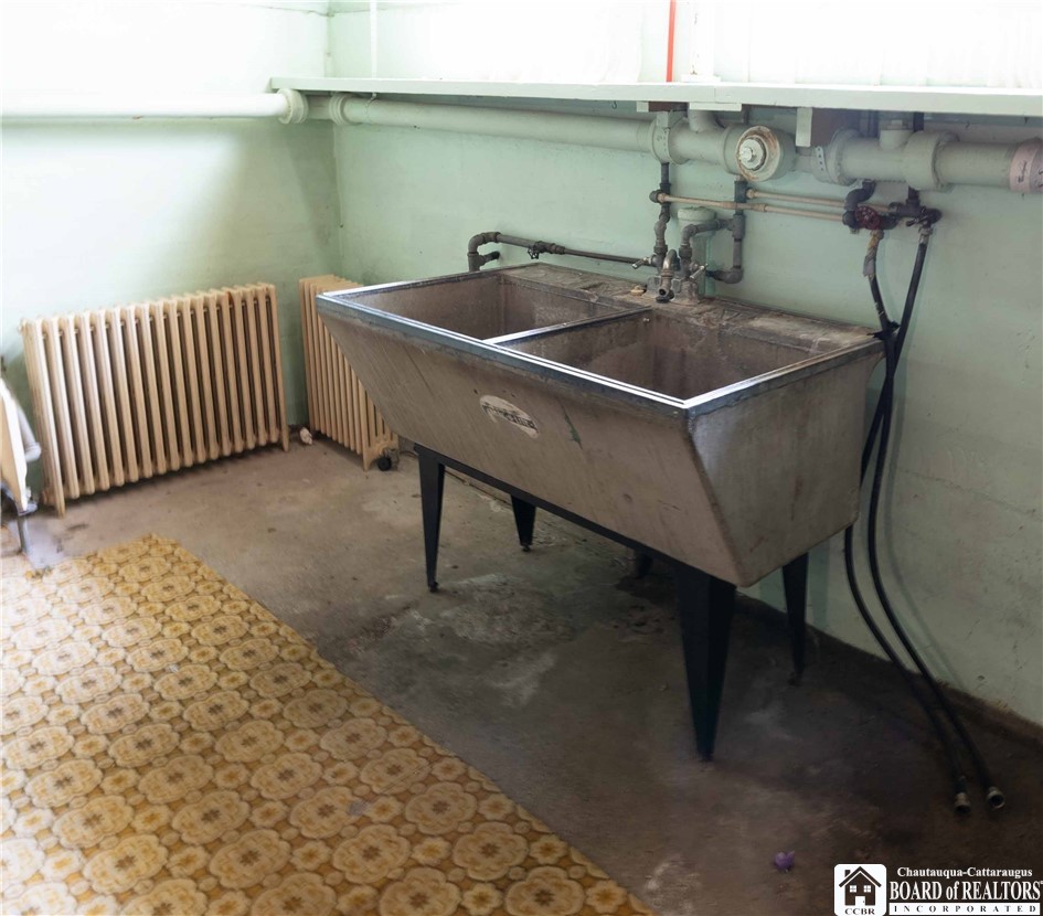 17 Lodi Street Hanover, NY 14062 - Photo 31 of 33 Utility sink in basement