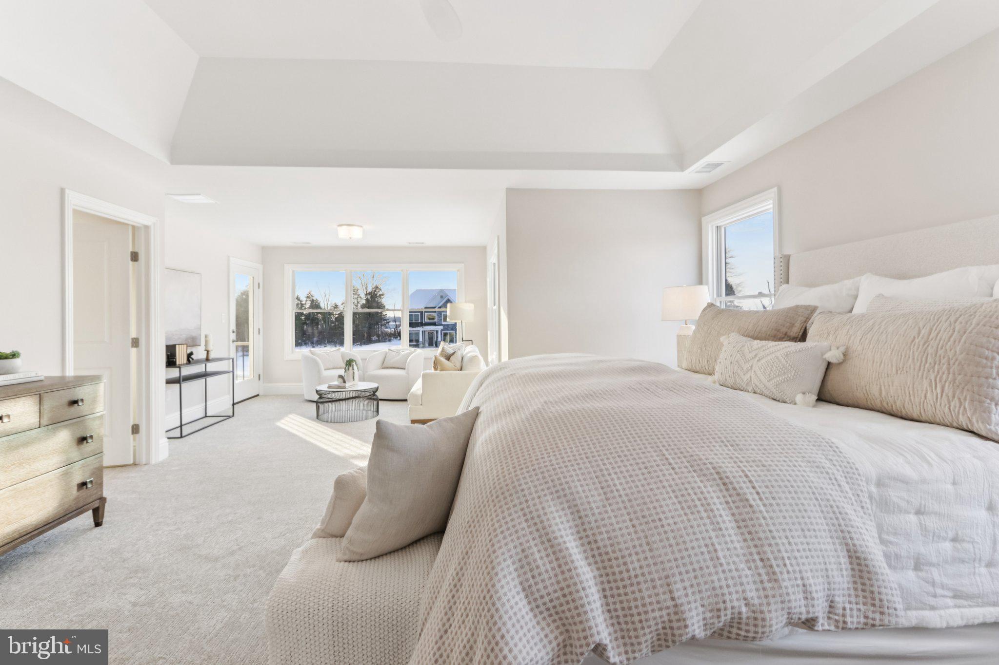 510 Newcomen Road, Unit B3D Exton, PA 19341 - Photo 54 of 74 a spacious bedroom with a bed and large windows