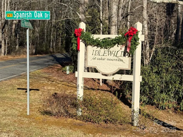 a sign board on the side of the road